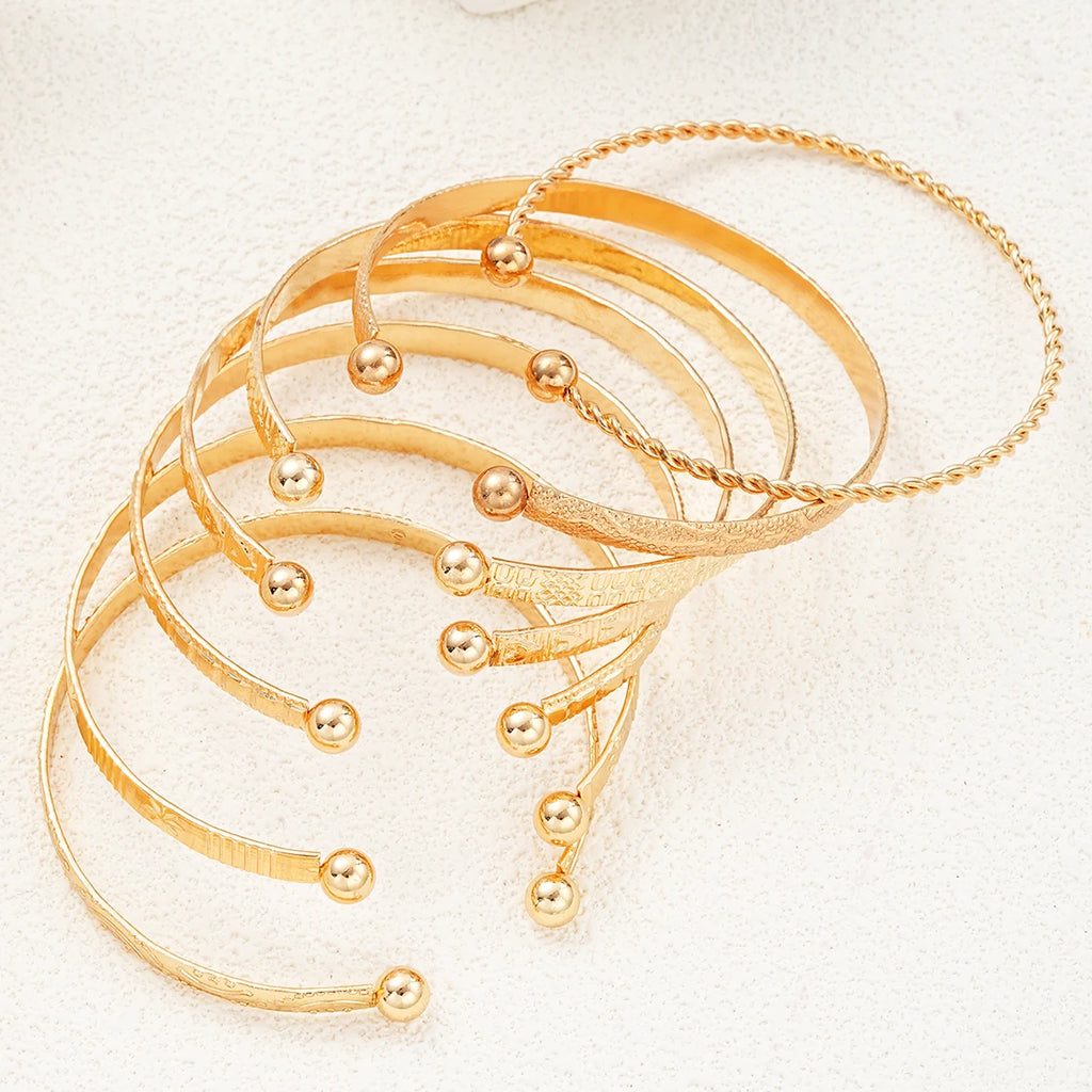 7 PCS Punk Gold Bracelet Set for Women – Goth Streetwear Open Bangles with Heart Metal Design (2024)